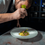 Chef prepares a Loch Duart Salmon dish.